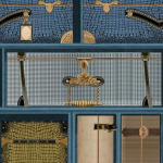 Mind The Gap THE LUGGAGE CAR WP20781 Features a rich navy blue background with accents of tan, brass, em...