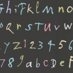 Osborne & Little Quentin's ABC W6062-07 Multi-coloured pastels set on a black background.