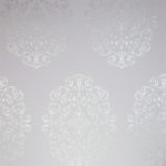 Osborne & Little Zecca W6180-01 Silver on pale lilac.